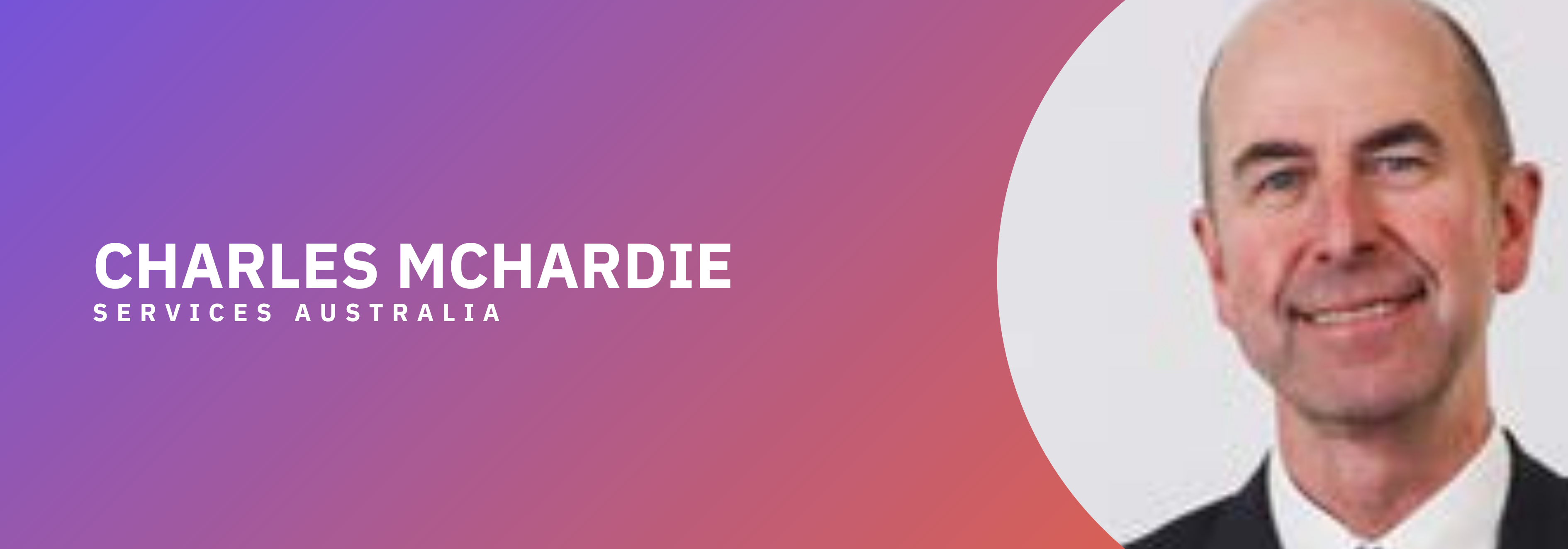 White text: Charles McHardie, image: headshot of a smiling white man