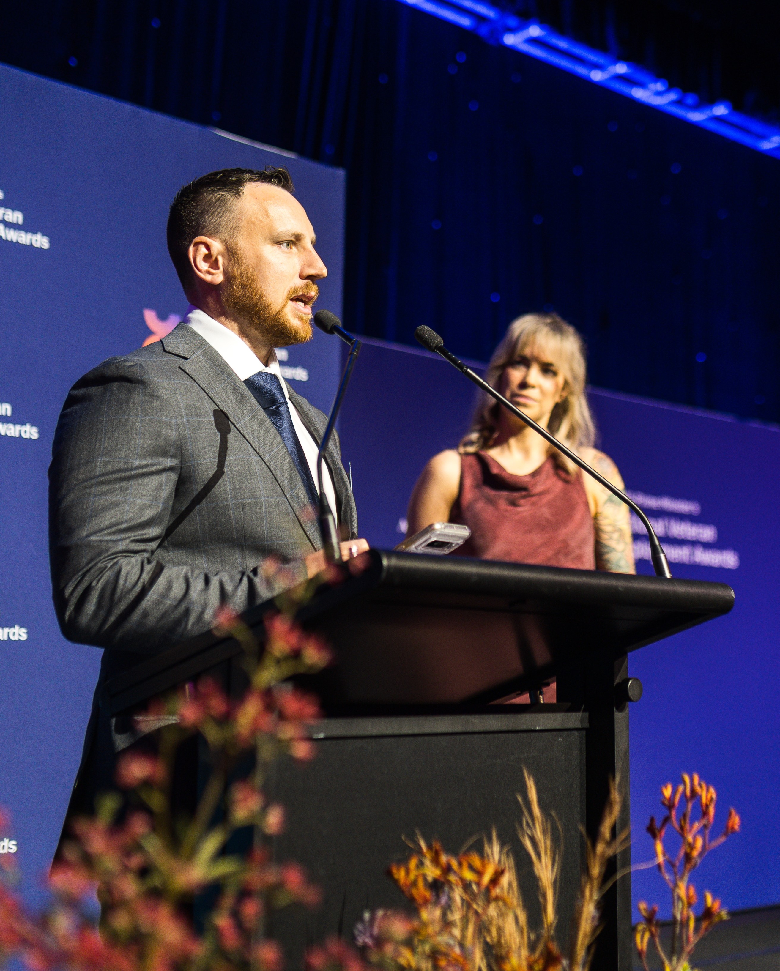 Man at podium giving speech