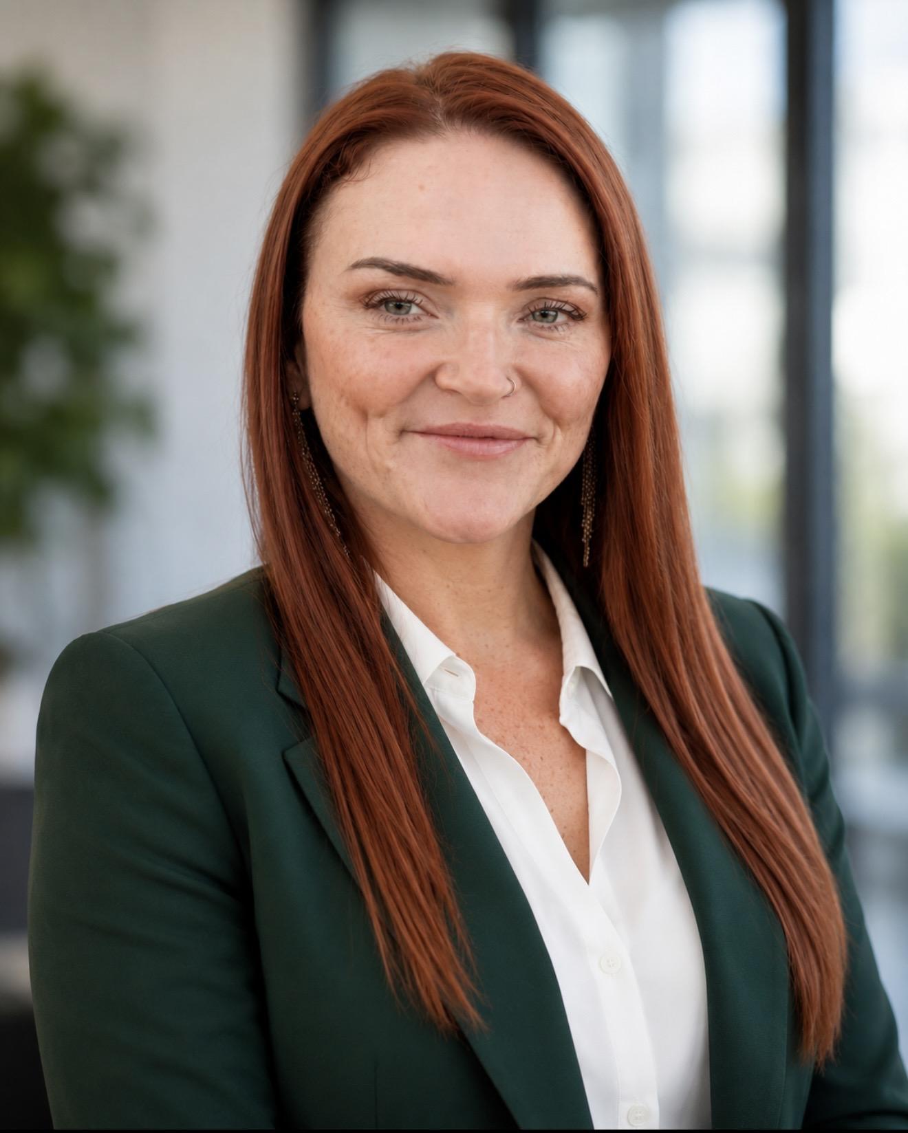 Woman with red hair smiling