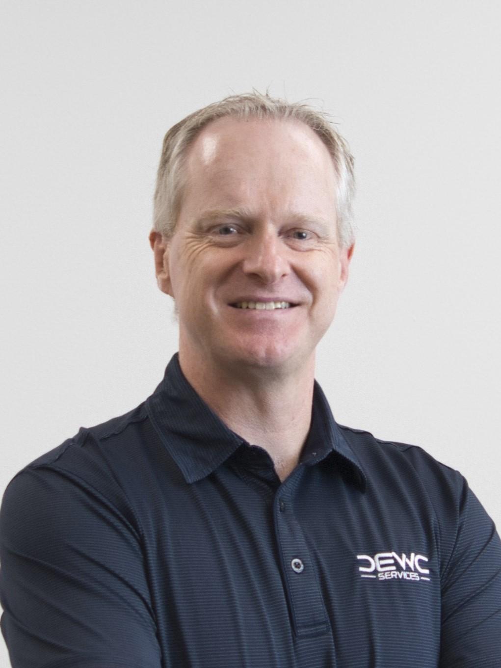 Smiling man in black shirt