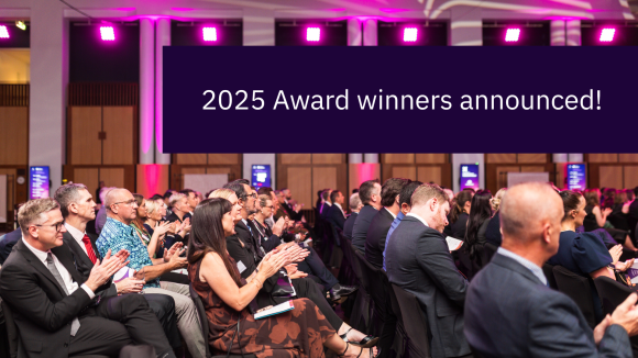 Title: 2025 Award winners announced! overlaying a room of people applauding