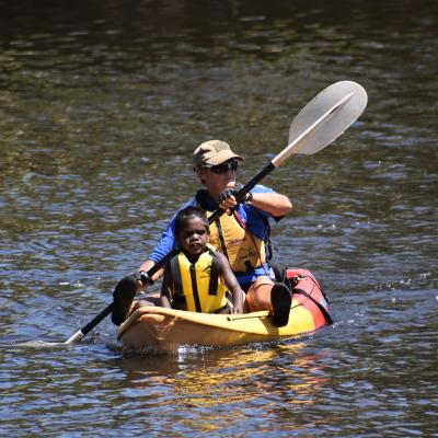 Pamela Dillon kayaking with a student